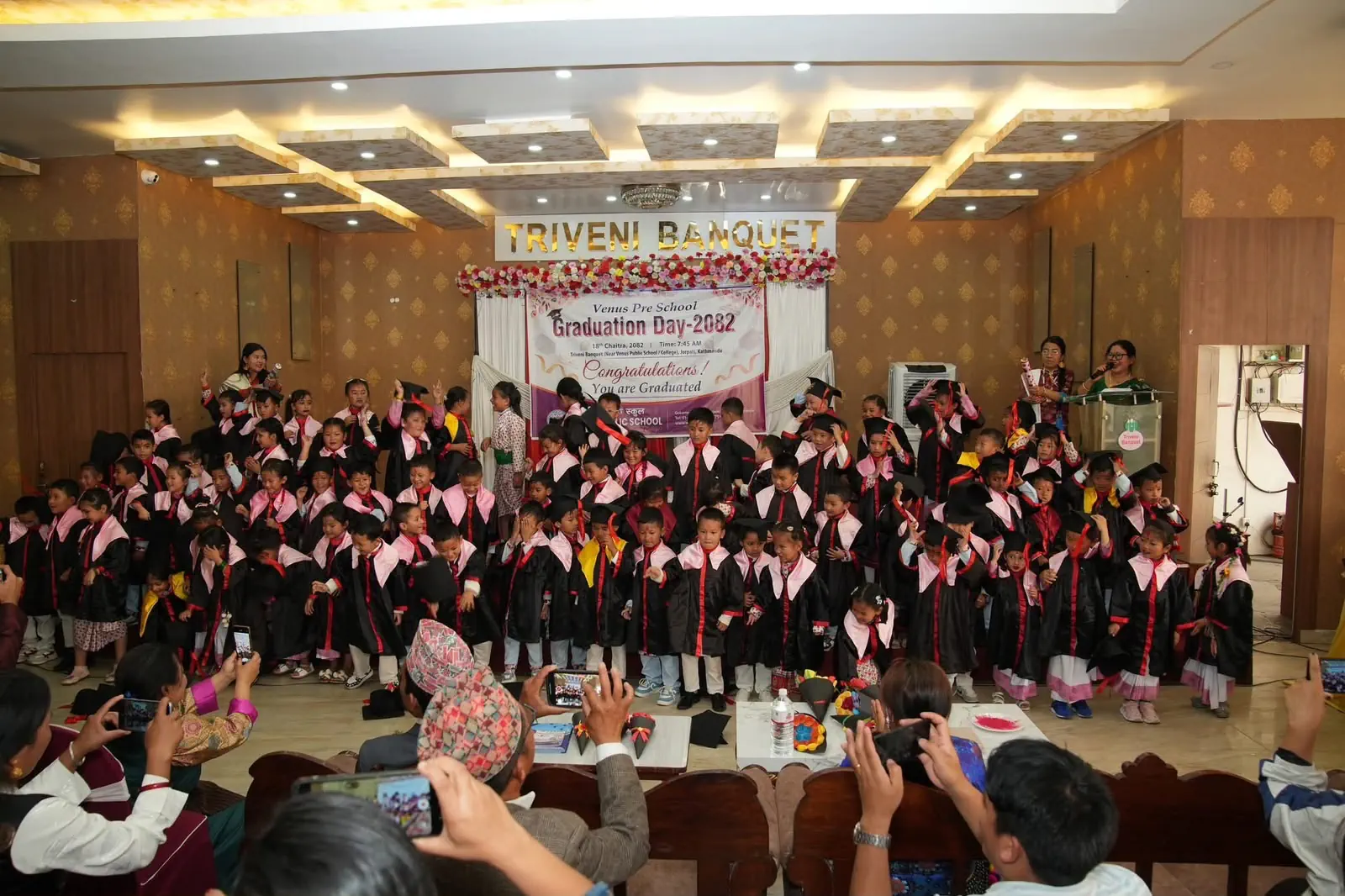 Venus Pre School graduation day event with children in graduation robes