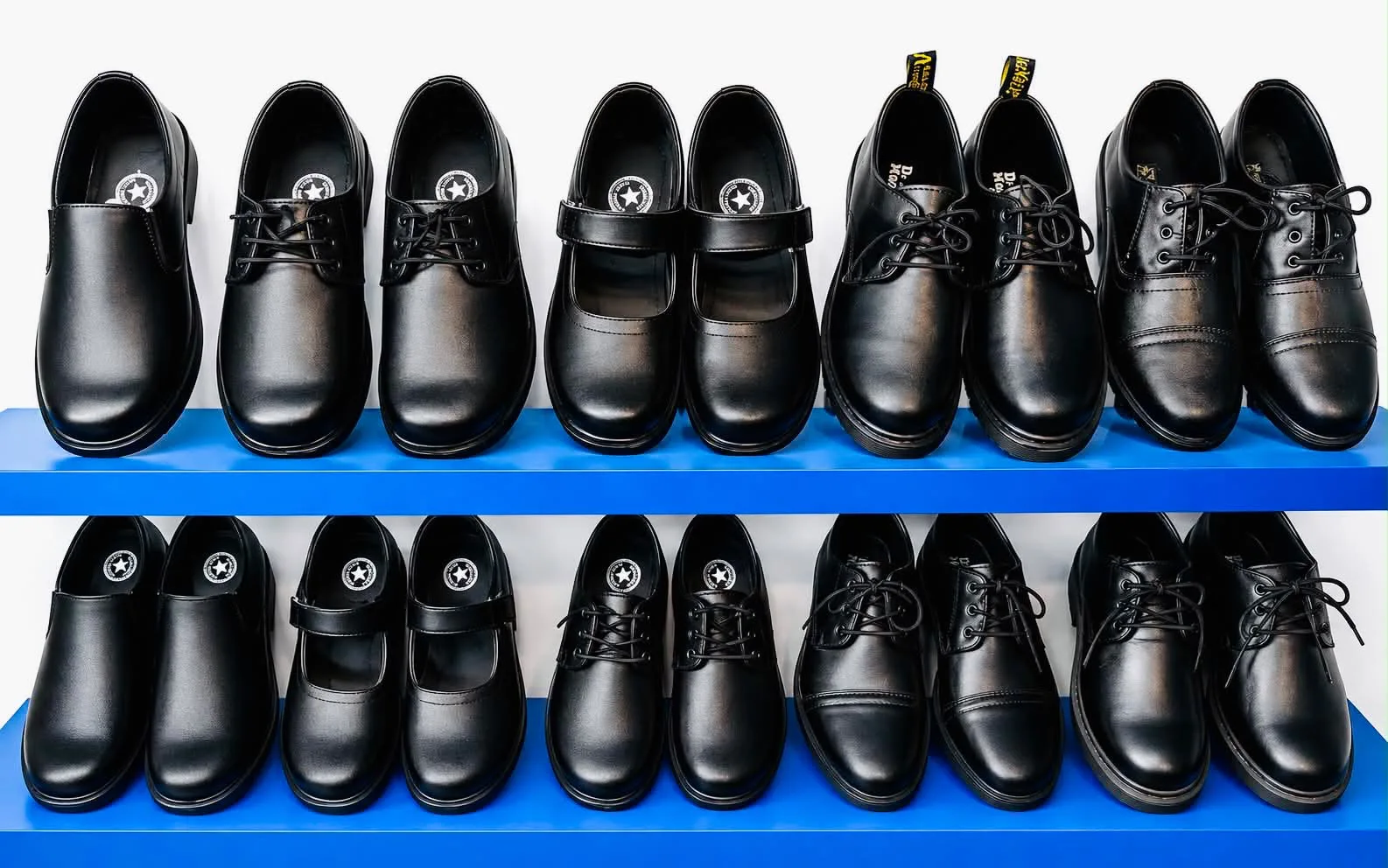 Formal black school shoes displayed as institutional footwear references